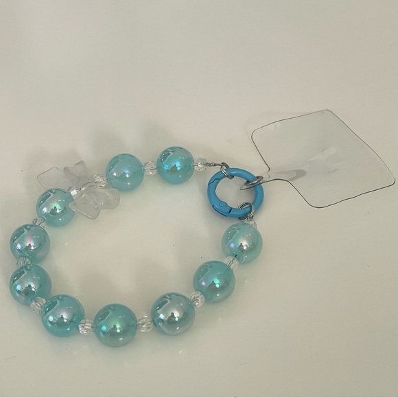Large Blue Beaded with Clear Bow Charm Phone Accessory Wristlet with Phone Tab - Picture 8 of 15